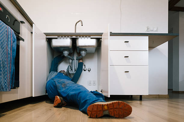 Professional Drain Cleaning technician working in Spirit Lake, ID